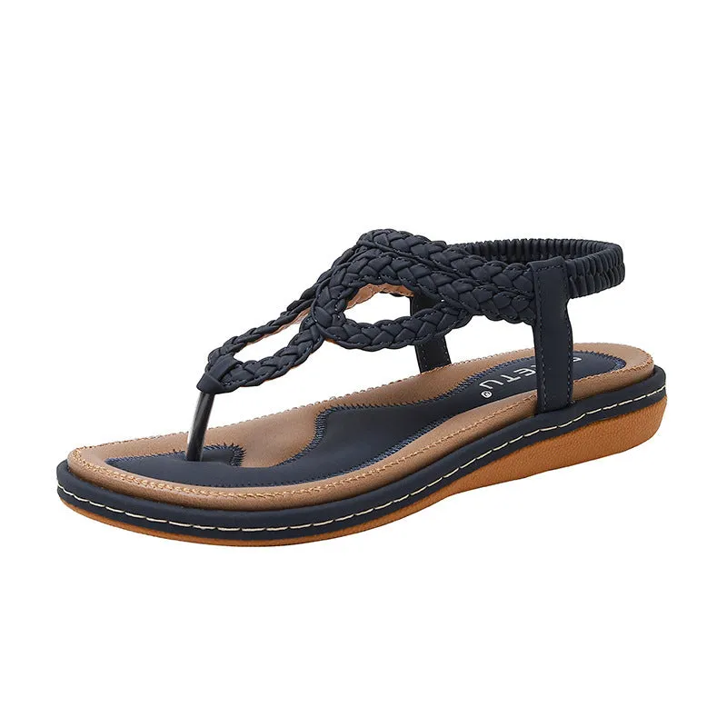 Women's woven flat sandals in solid colour low top with rubber sole, available in black apricot or sapphire blue