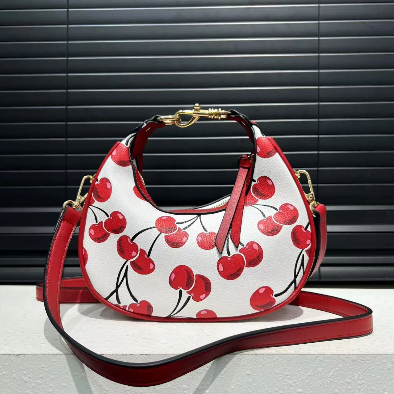 Stitching soft PU leather hobo crossbody bag for women in black with love and chain details, urban simplicity style