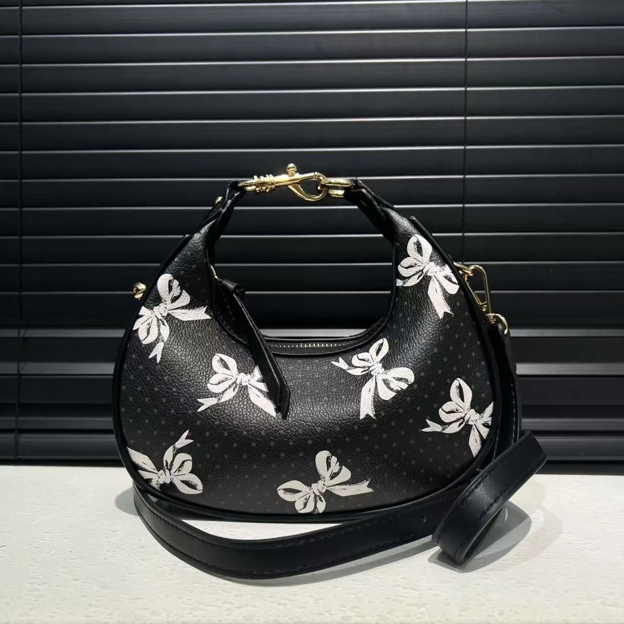 Stitching soft PU leather hobo crossbody bag for women in black with love and chain details, urban simplicity style
