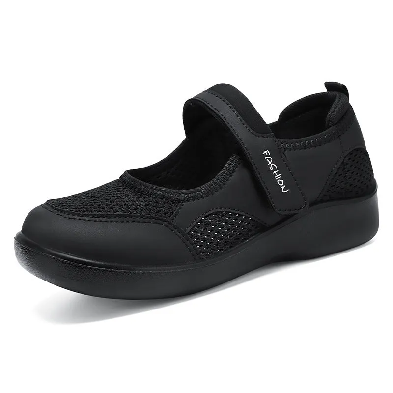 Women's low-top casual shoes in grey with mesh upper and Velcro strap.