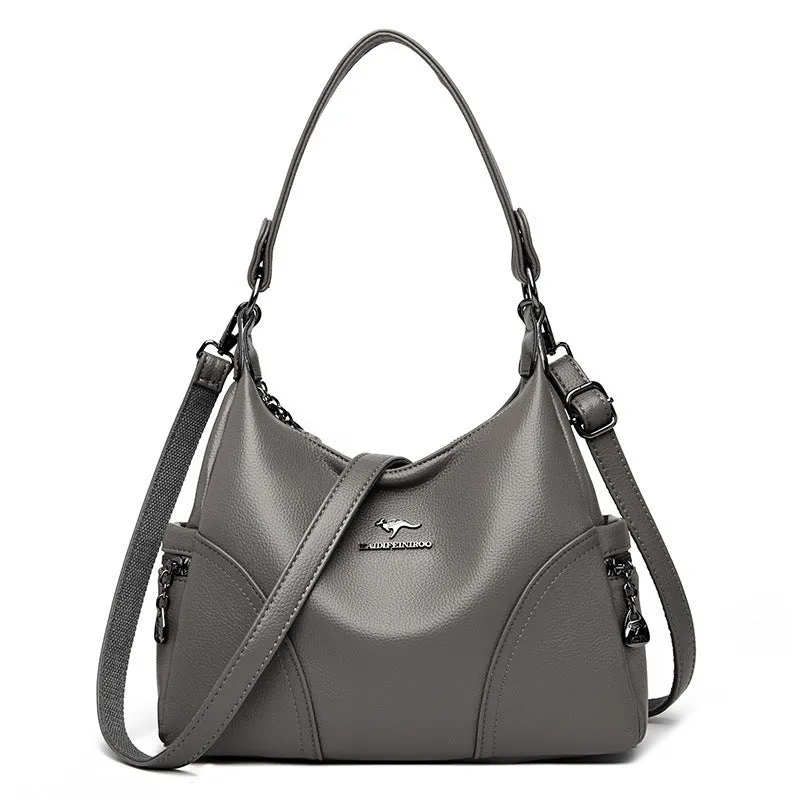 Women's PU messenger bag in beige with single shoulder strap and horizontal square shape