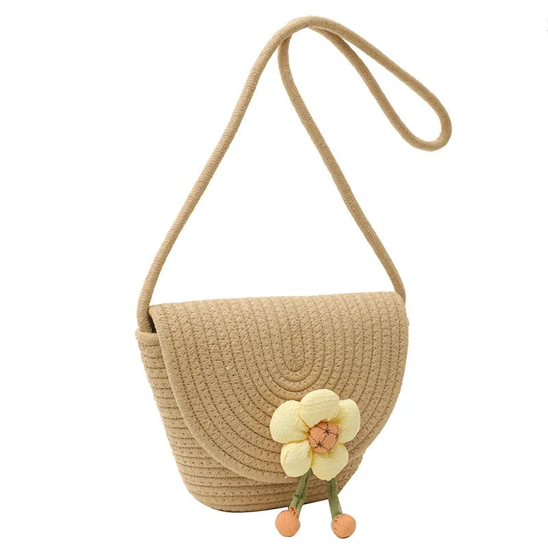 Cotton and linen bucket bag with woven flower details, clamshell shape, available in five colours including sky blue