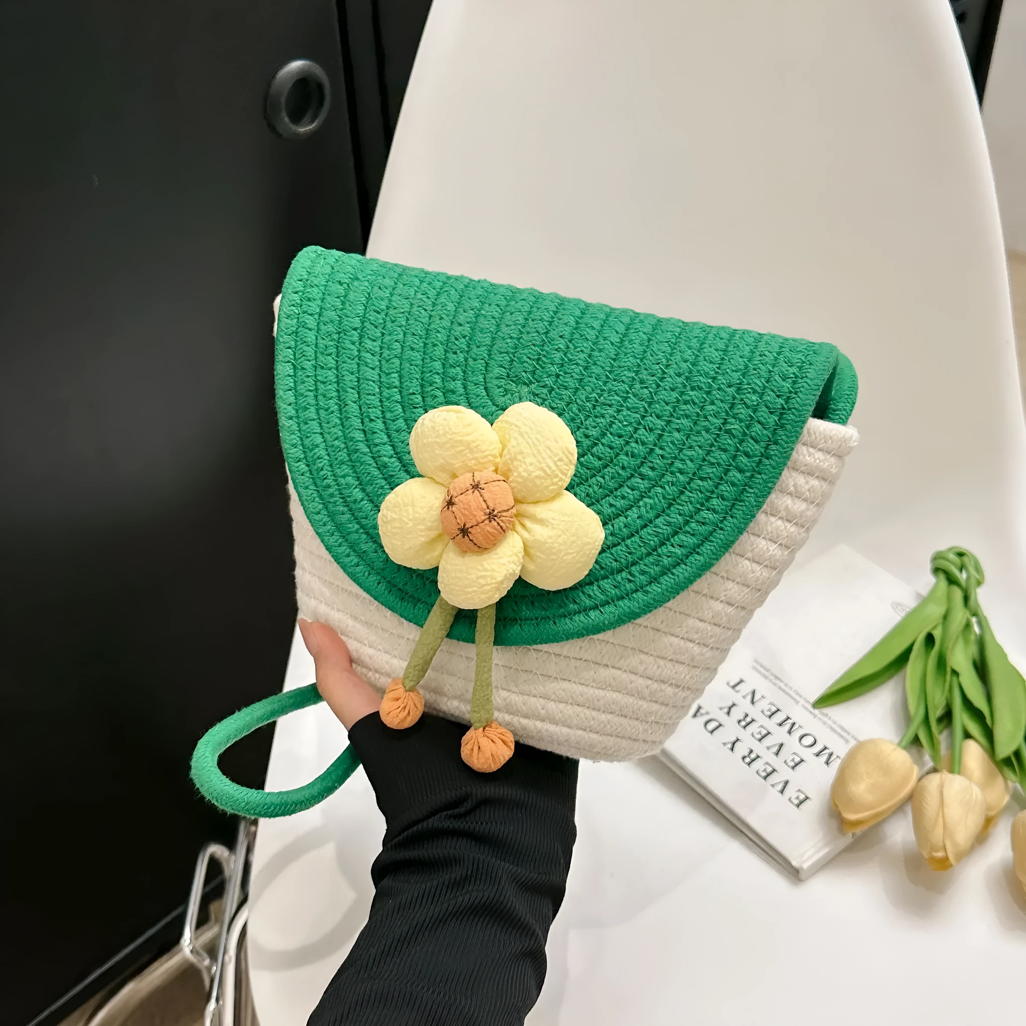 Cotton and linen bucket bag with woven flower details, clamshell shape, available in five colours including sky blue