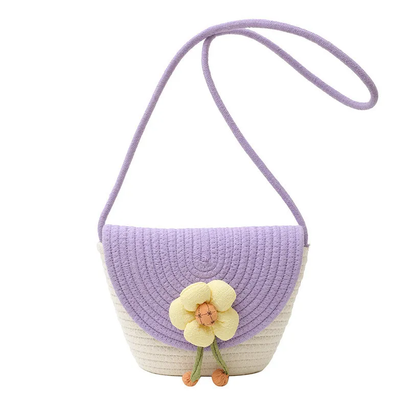 Cotton and linen bucket bag with woven flower details, clamshell shape, available in five colours including sky blue