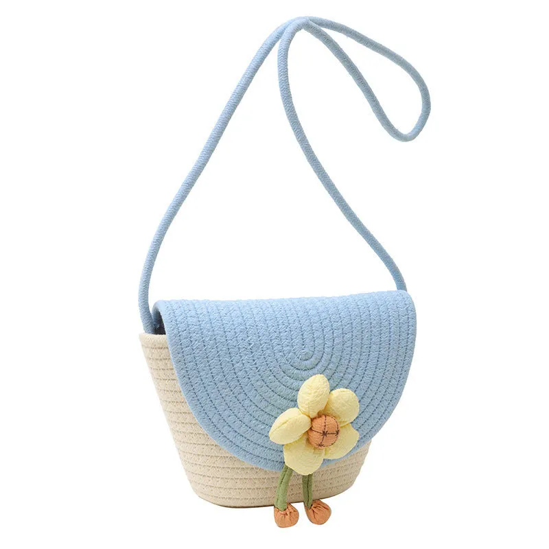 Cotton and linen bucket bag with woven flower details, clamshell shape, available in five colours including sky blue