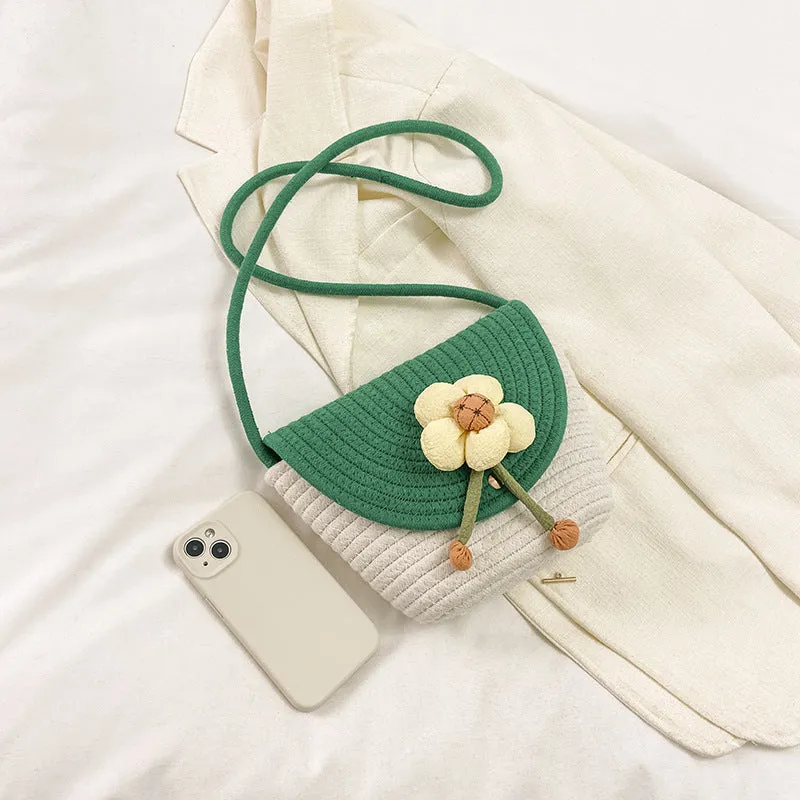 Cotton and linen bucket bag with woven flower details, clamshell shape, available in five colours including sky blue