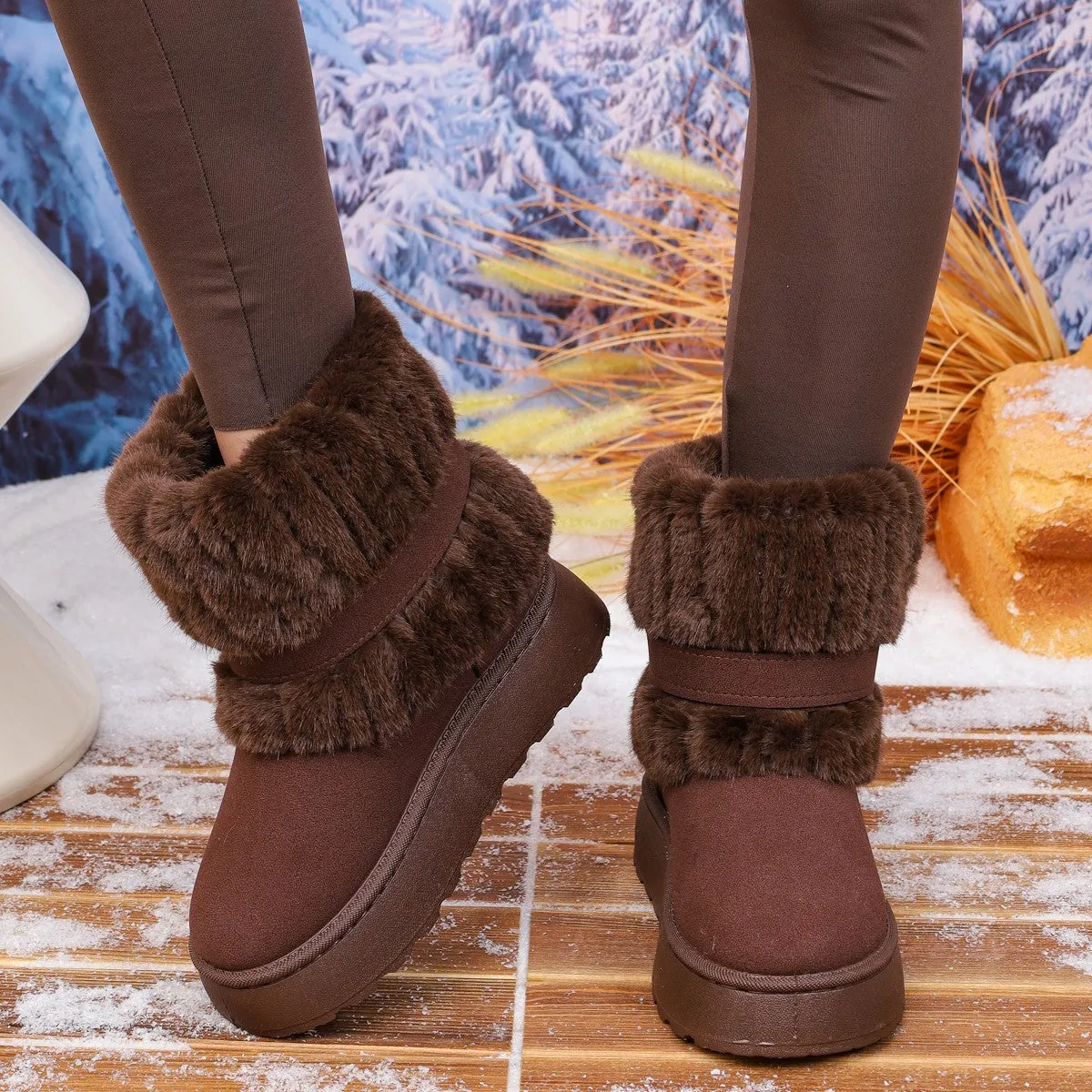 Women's plus size fleece lined ankle snow boots in black with cowhide leather upper and non-slip rubber sole