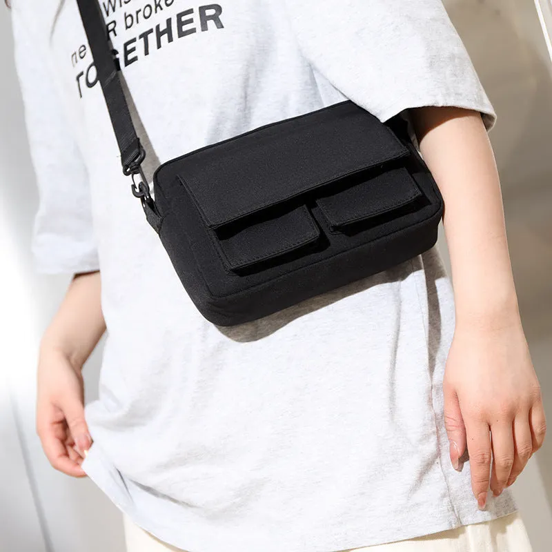 Men's lightweight nylon shoulder bag in black with messenger style for student travel and business use