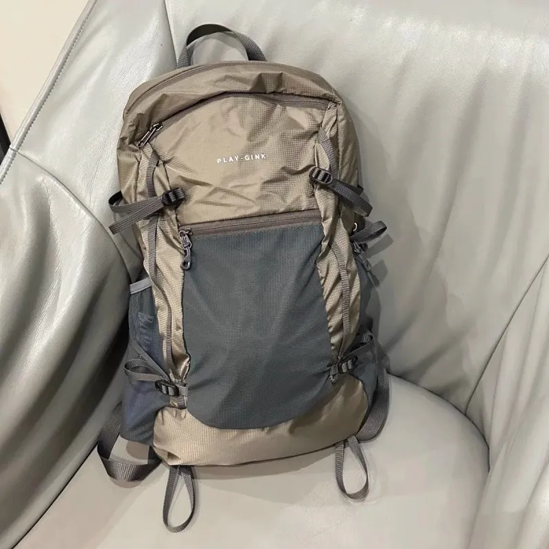 Natural revival khaki light solid colour nylon backpack with contrast details and curved shoulder straps