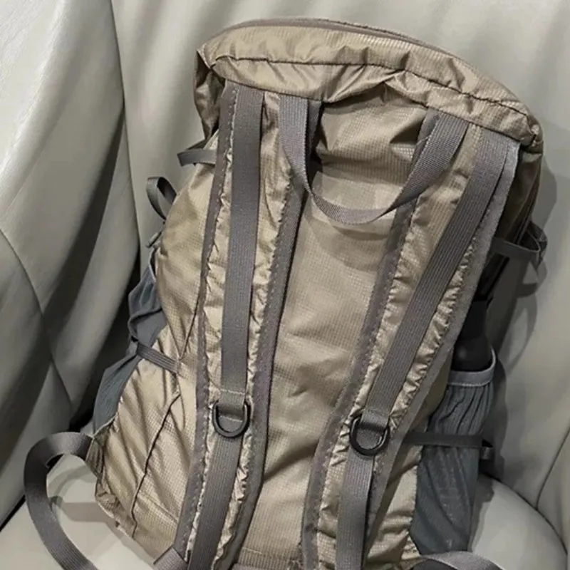 Natural revival khaki light solid colour nylon backpack with contrast details and curved shoulder straps