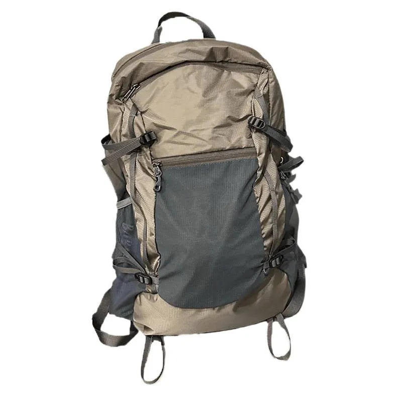 Natural revival khaki light solid colour nylon backpack with contrast details and curved shoulder straps