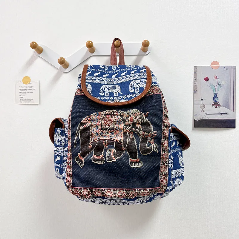 Canvas drawstring backpack with elephant embroidery in one of twelve colour options, size 28x24x12cm