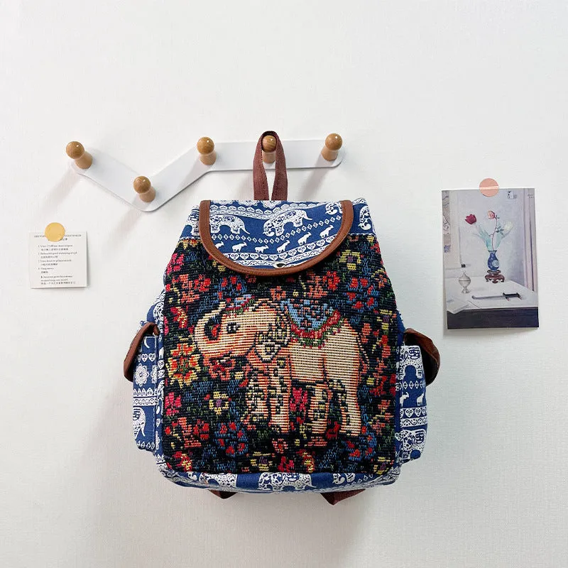 Canvas drawstring backpack with elephant embroidery in one of twelve colour options, size 28x24x12cm