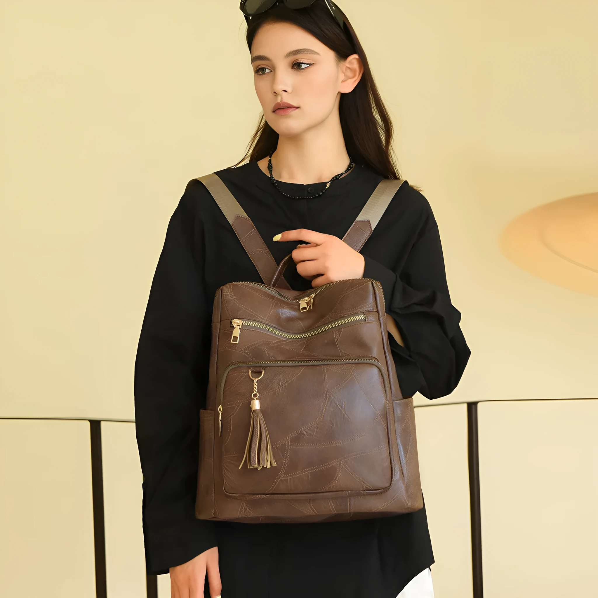 Women's large-capacity retro PU backpack with plaid design in brown, three-dimensional outer pocket visible