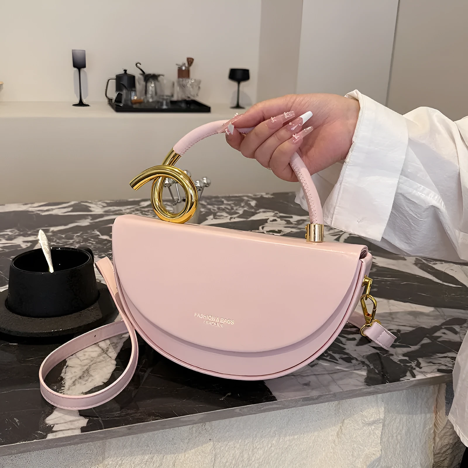 Medium hard PU box saddle bag in solid colour with internal zipper pocket and oval shape