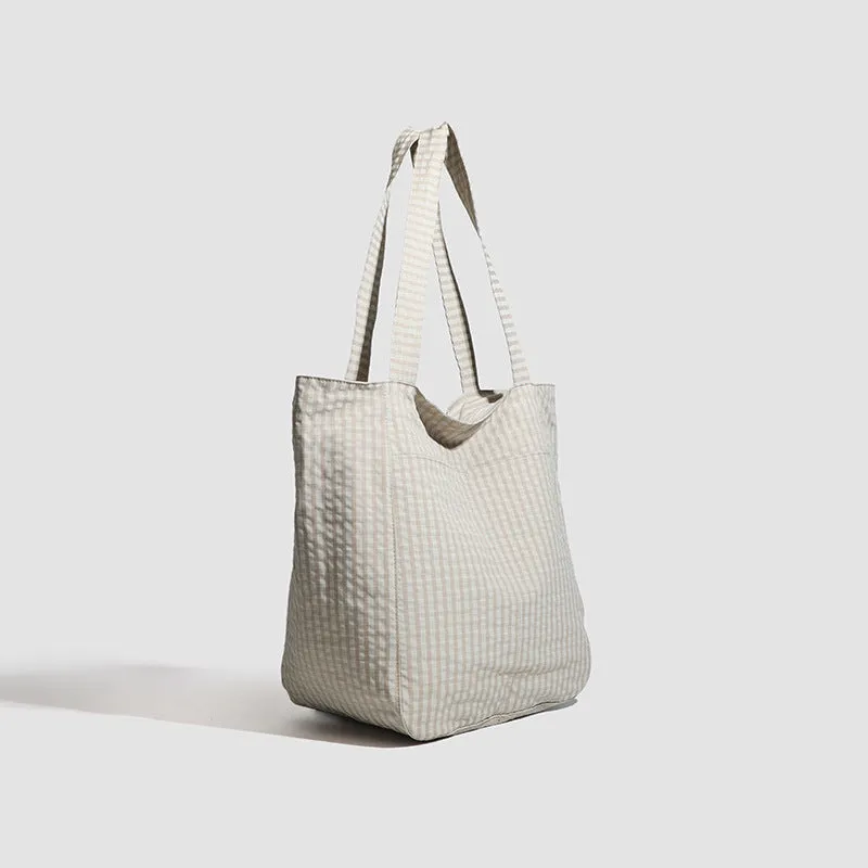 Polyester striped seersucker women's bag with horizontal square shape and three-dimensional pocket in apricot colour