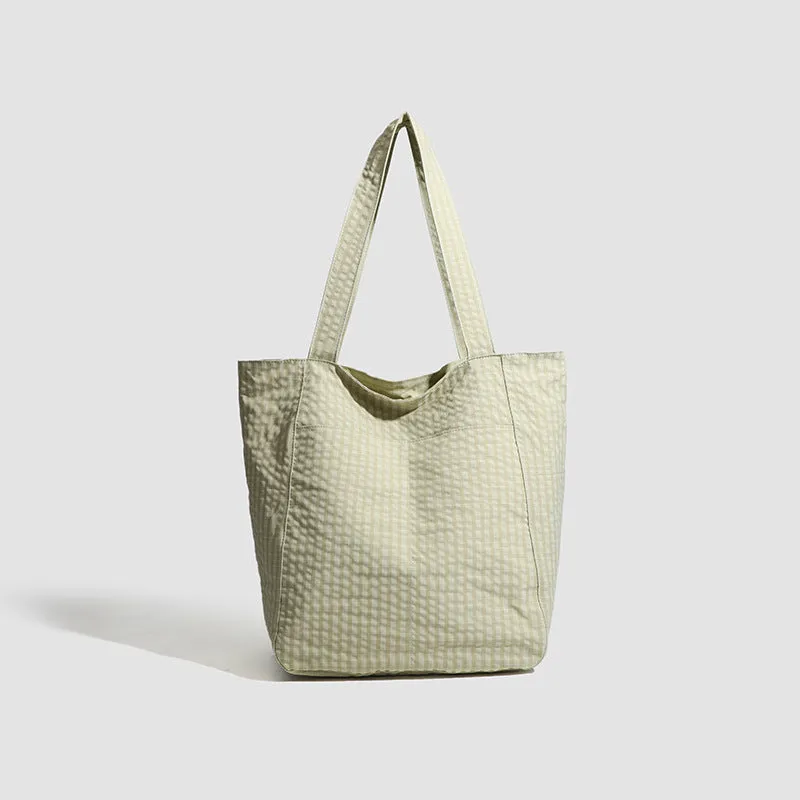 Polyester striped seersucker women's bag with horizontal square shape and three-dimensional pocket in apricot colour