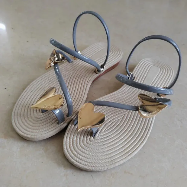 Women's summer flat sandals with decorative button and bow in quick-drying PU EVA material, side view