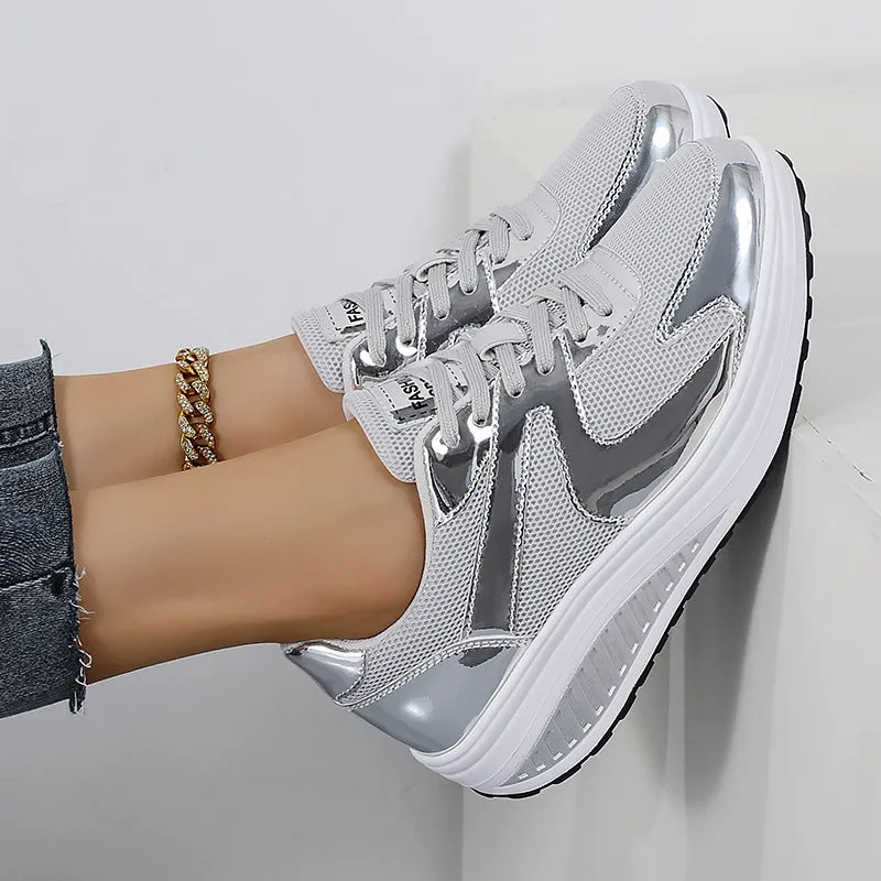 Women's gold platform trainers with mesh upper, cross-strap design and waterproof platform