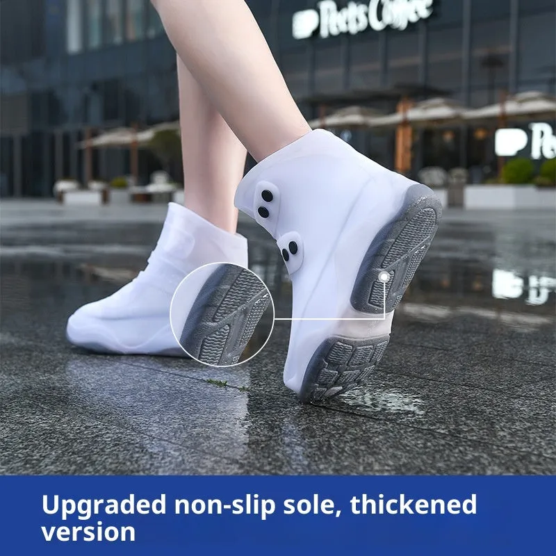 Set of waterproof silicone shoe covers in black, blue, orange, and white with non-slip soles