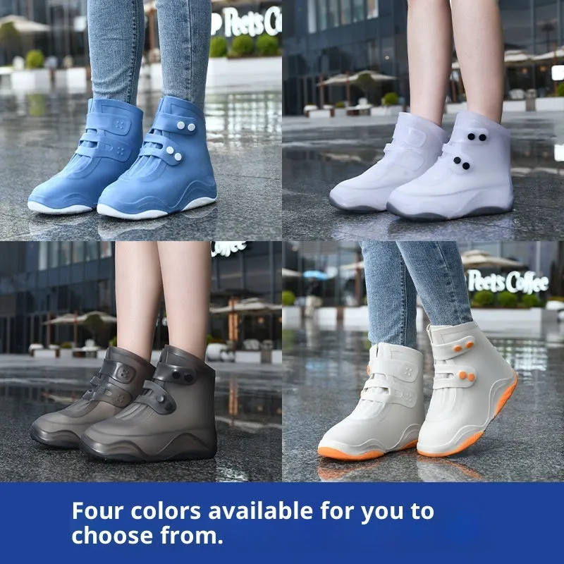Set of waterproof silicone shoe covers in black, blue, orange, and white with non-slip soles