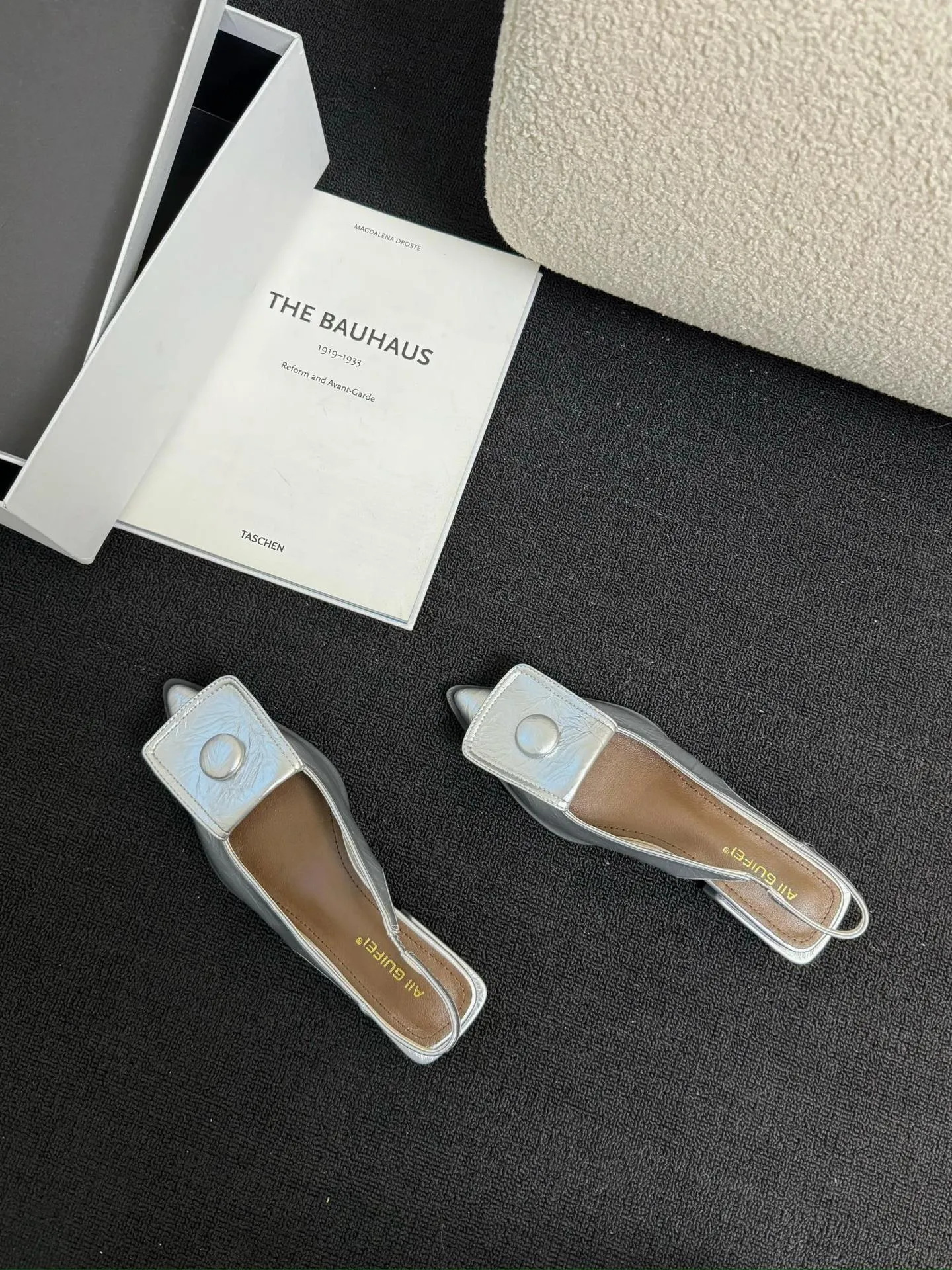 Women's low-heel closed toe sandals with a pointed toe and a back strap in apricot colour.