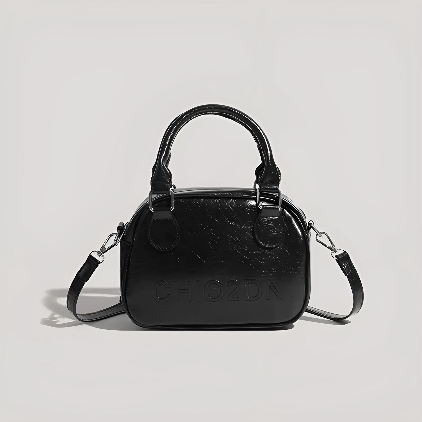 Retro PU crossbody bag with letter and stitching details in horizontal square shape, black colour