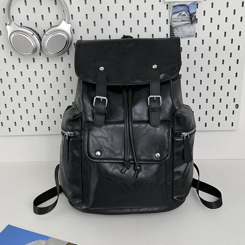 Solid colour PU couple travel backpack in black, curved shoulder strap, waterproof design for leisure travel