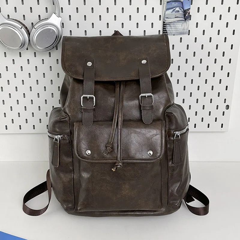 Solid colour PU couple travel backpack in black, curved shoulder strap, waterproof design for leisure travel