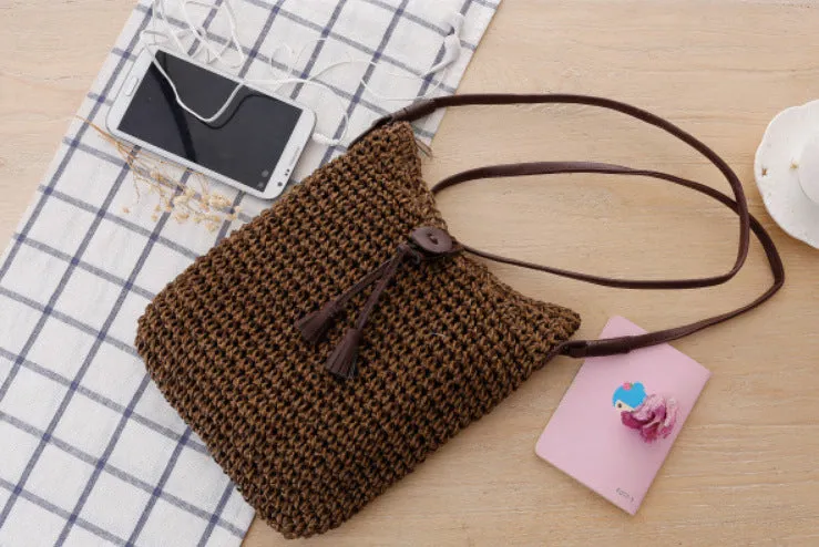 Handmade crochet crossbody straw bag for children with cotton lining in khaki colour