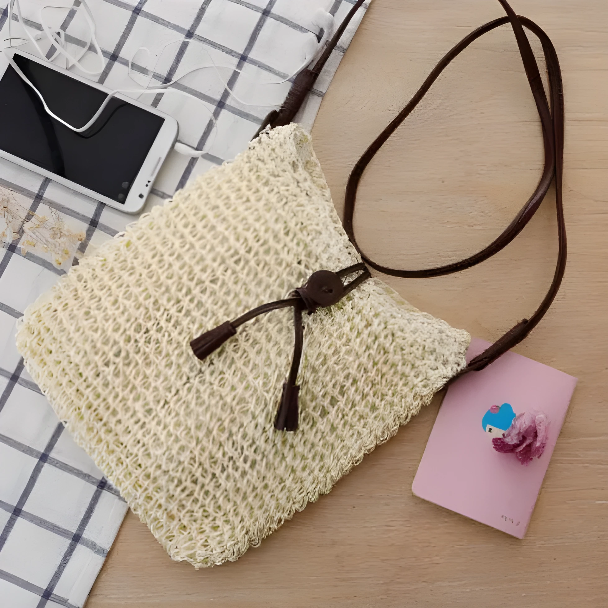Handmade crochet crossbody straw bag for children with cotton lining in khaki colour