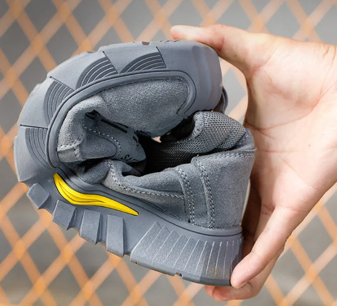 Men's winter high-top velvet cotton safety shoes with steel toe on grey background