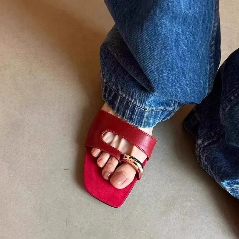 Women's plus size square toe leather slipper with rubber sole in black, red, silver, or white.