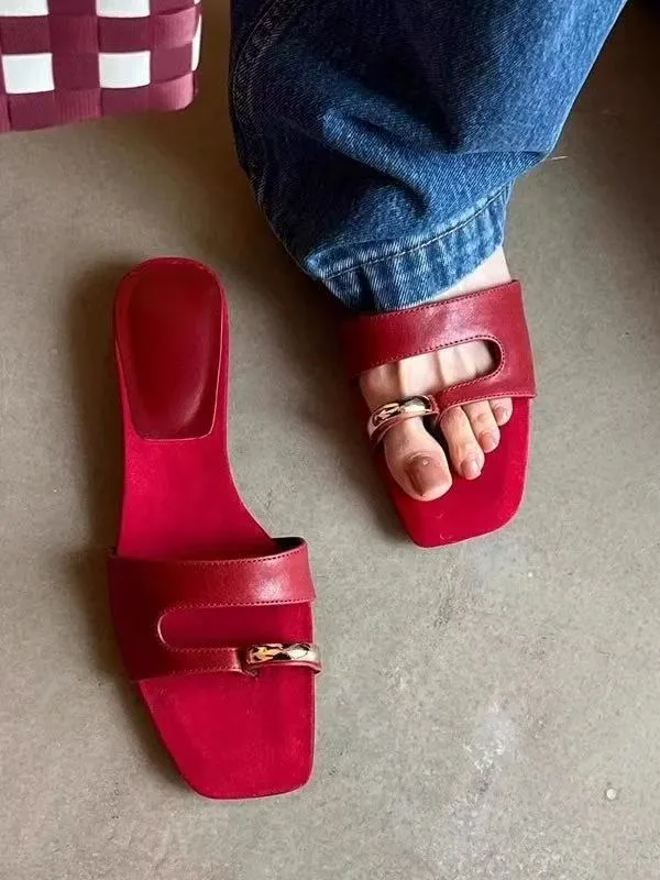 Women's plus size square toe leather slipper with rubber sole in black, red, silver, or white.