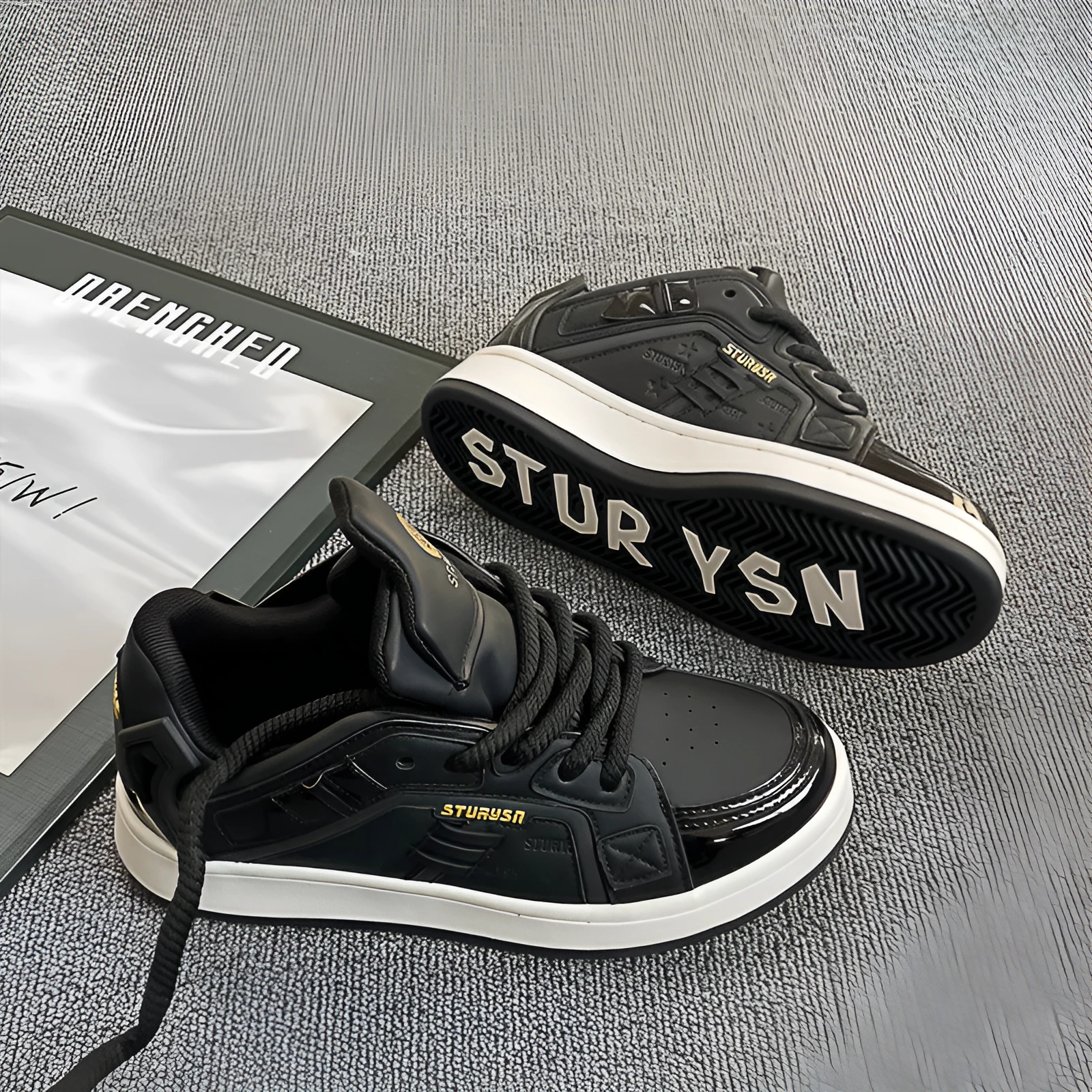 Men's black thick bottom board shoes with PU leather upper and rubber sole on a light background