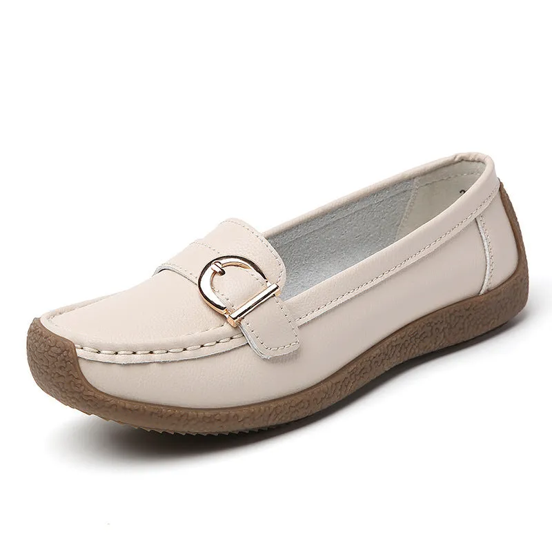 Women's beige casual loafers with round toe and flat beef tendon sole on a white background.