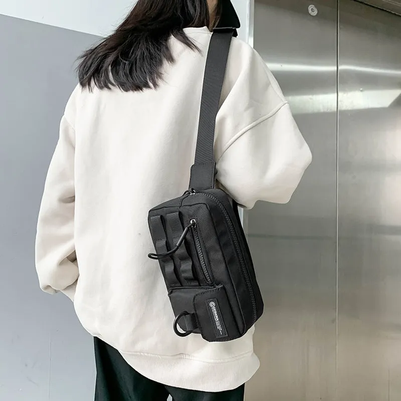 Tooling style crossbody bag in solid colour with wear-resistant nylon for outdoor sports use, below 20L capacity