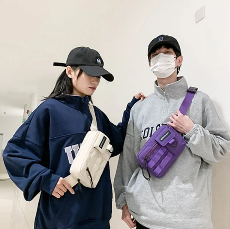 Tooling style crossbody bag in solid colour with wear-resistant nylon for outdoor sports use, below 20L capacity