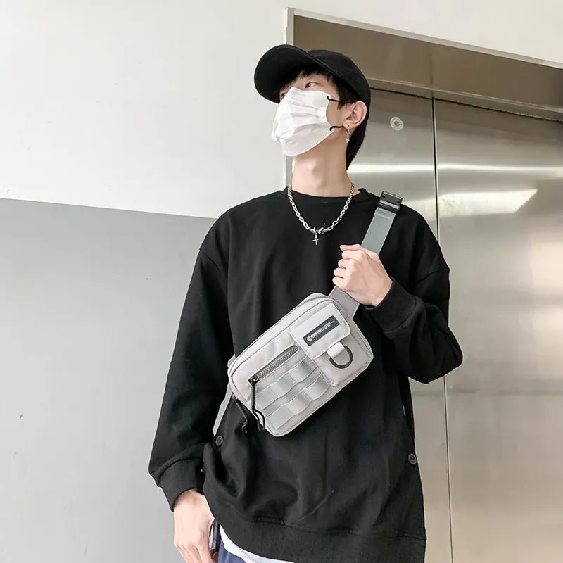 Tooling style crossbody bag in solid colour with wear-resistant nylon for outdoor sports use, below 20L capacity