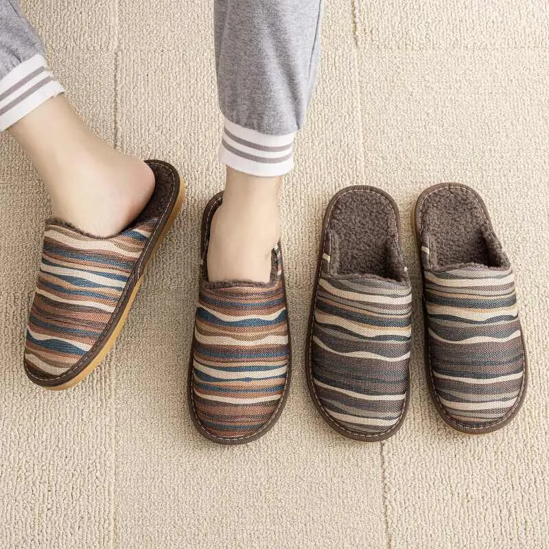 Household cotton slippers with winter linen surface and PVC sole in various floral colour patterns
