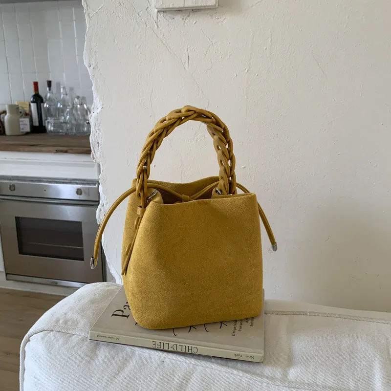 Fashion suede crossbody bag with stitching details, PU material, available in multiple colours like watermelon red and brown