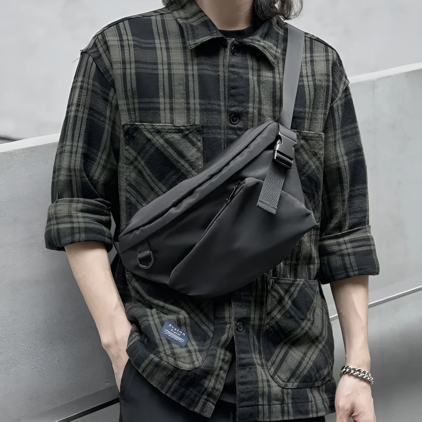 Black Oxford fabric men's chest bag with slanted street style design and sewing line details