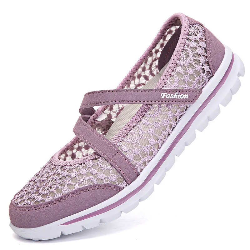 Women's mesh lace-up casual flat shoes in beige colour showing round toe and flat heel design