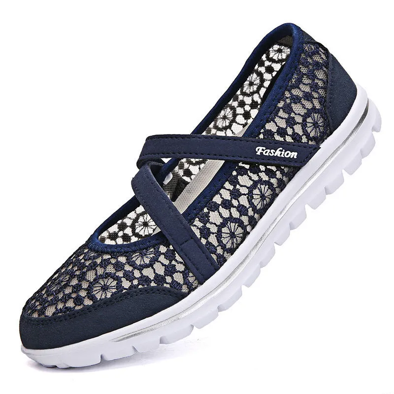 Women's mesh lace-up casual flat shoes in beige colour showing round toe and flat heel design