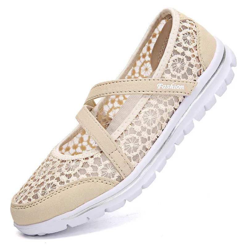Women's mesh lace-up casual flat shoes in beige colour showing round toe and flat heel design