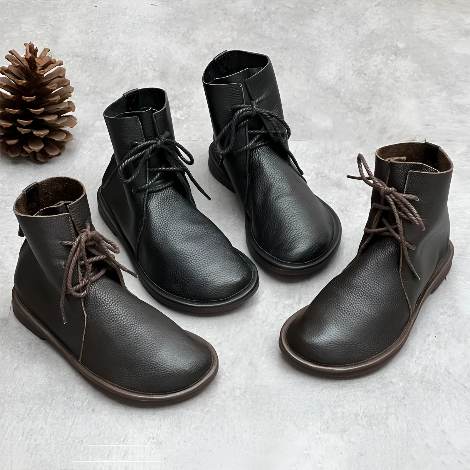 Retro genuine leather Martin boots for women in black, flat heel, round toe, front tie strap.