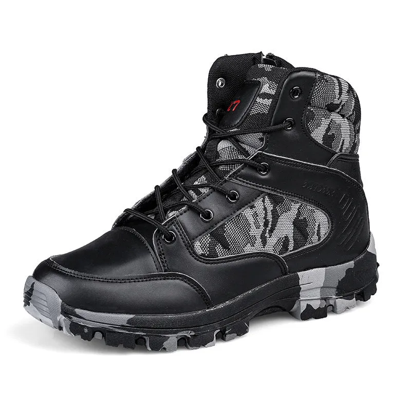 Men's black high-top hiking shoe with metal detail on a rugged outdoor surface