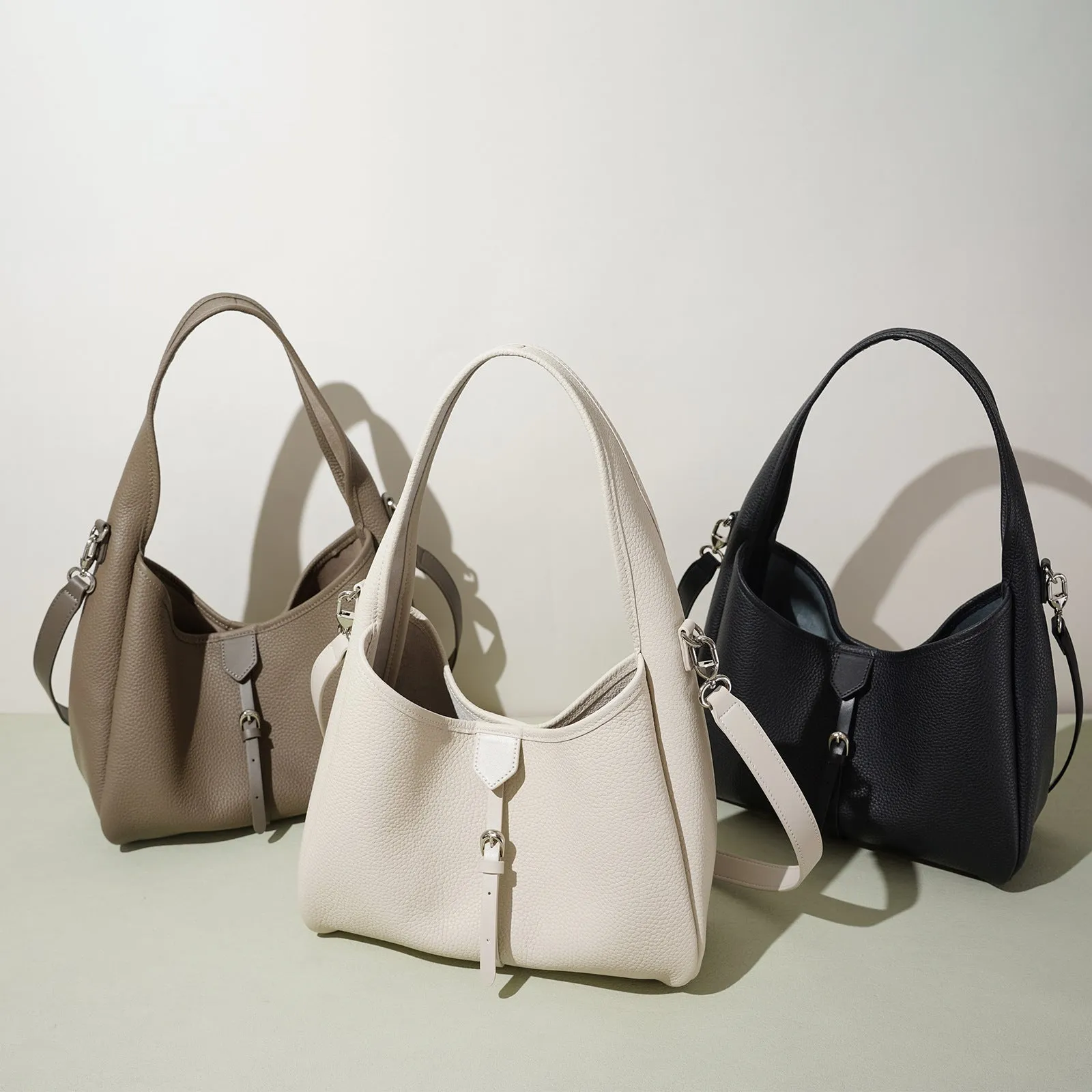 Fashion minimalist single shoulder crossbody handbag in genuine leather, bucket shape, milkshake white colour