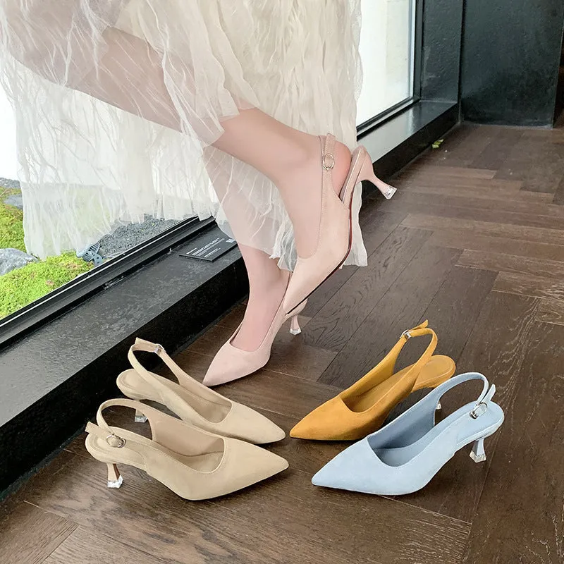 A pair of apricot-coloured suede pointed-toe stiletto high heels with a rubber sole.