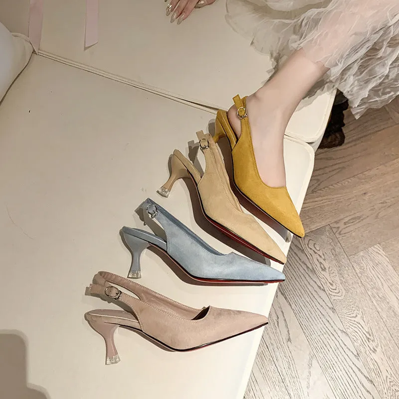 A pair of apricot-coloured suede pointed-toe stiletto high heels with a rubber sole.